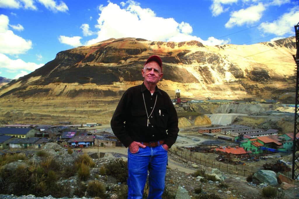 David Lowell posing in front of mountain