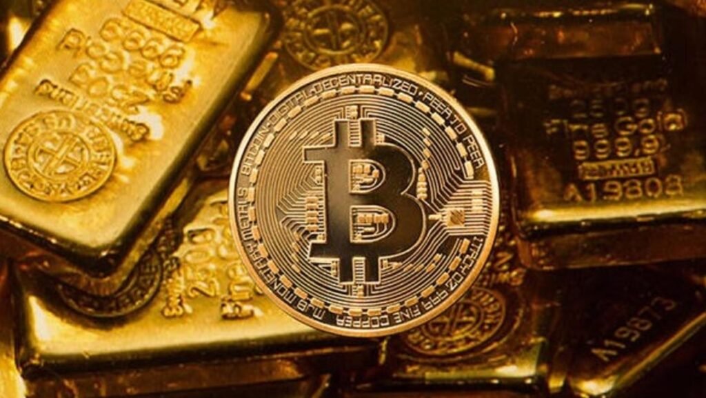 Bitcoin on top of gold bullion