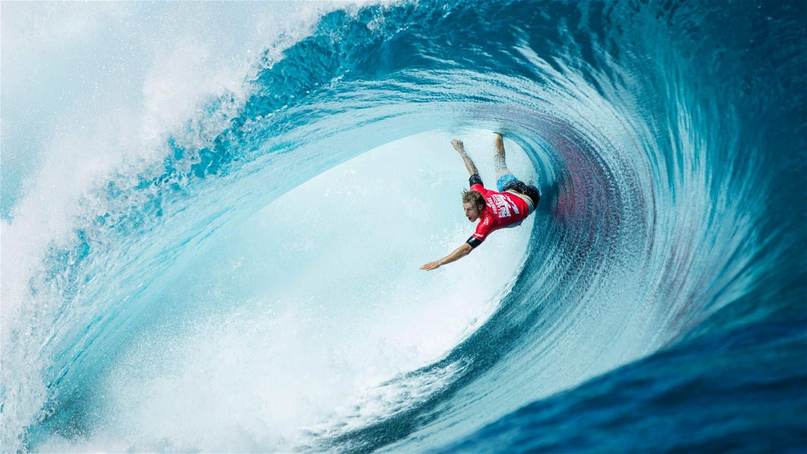 Man surfing huge wave